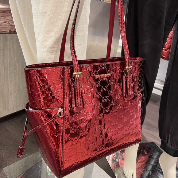 MICHAEL KORS Voyager Lg Metallic Logo Debossed EW Shoulder Tote Bag
Cherry 
NWT - Picture 4 of 16